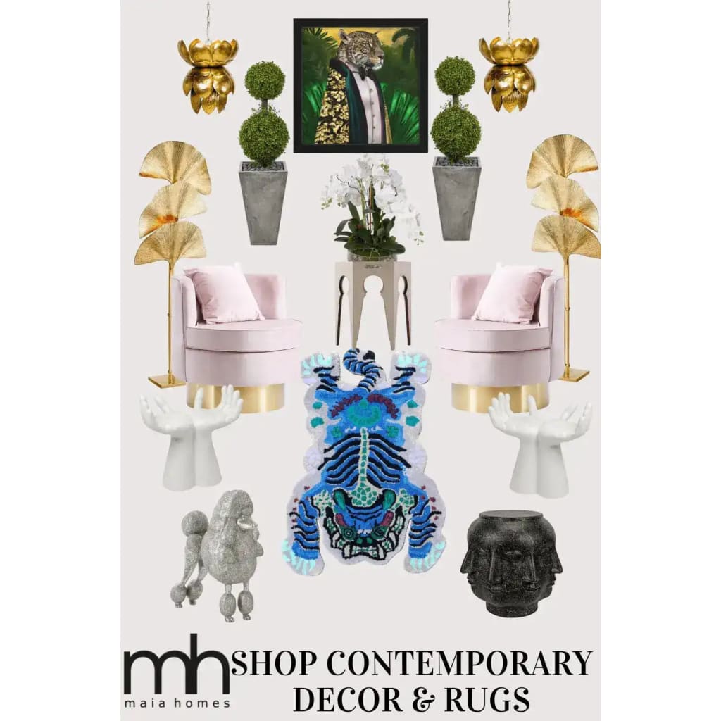 A vibrant Chinoiserie Tibetan Tiger Hand Tufted Wool Rug in blue, featured among contemporary decor items like plush pink chairs and stylish gold accents. Perfect for adding a bold touch to your office or dining room, this area rug combines luxury and artistic flair.