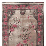 Chorus of Blossoms Knotted Wool Rug featuring a stunning floral design with vibrant pink blossoms on a neutral background. This elegant area rug is perfect for adding a touch of sophistication to living room spaces, showcasing the beauty of living room area rugs crafted from premium wool.