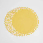 Citrus Glow round placemats stacked, solid yellow with white scalloped eyelet border, set of multiple