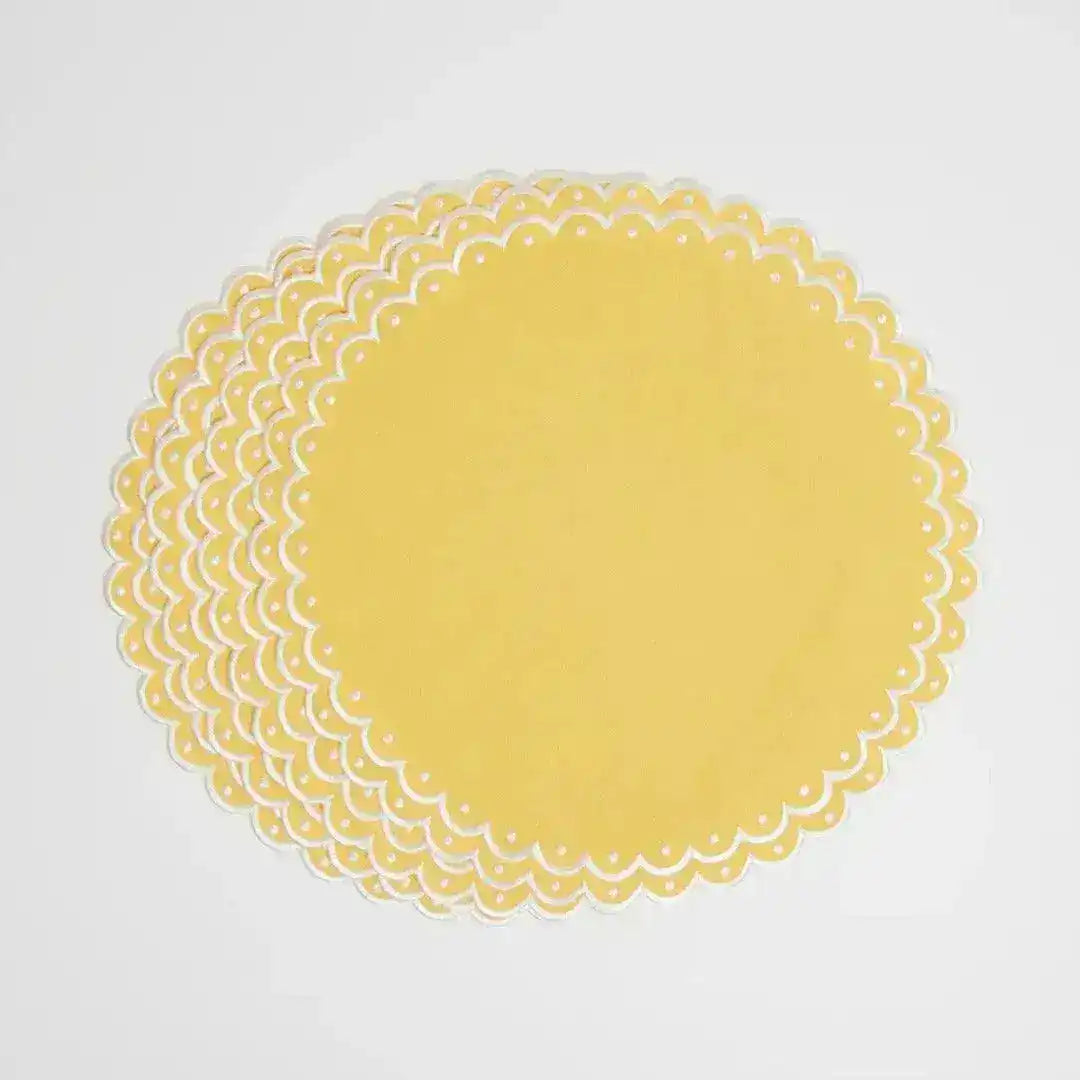 Citrus Glow round placemats stacked, solid yellow with white scalloped eyelet border, set of multiple