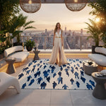 Elegant living room featuring a Cityscape Crowd Hand Tufted Area Rug in a sophisticated design. The wool rug complements the formal dining room aesthetic with a stylish pattern, seamlessly integrating with the decor of the dining table and living room. The space is warmly lit with natural light from large windows, enhancing the room's inviting atmosphere.