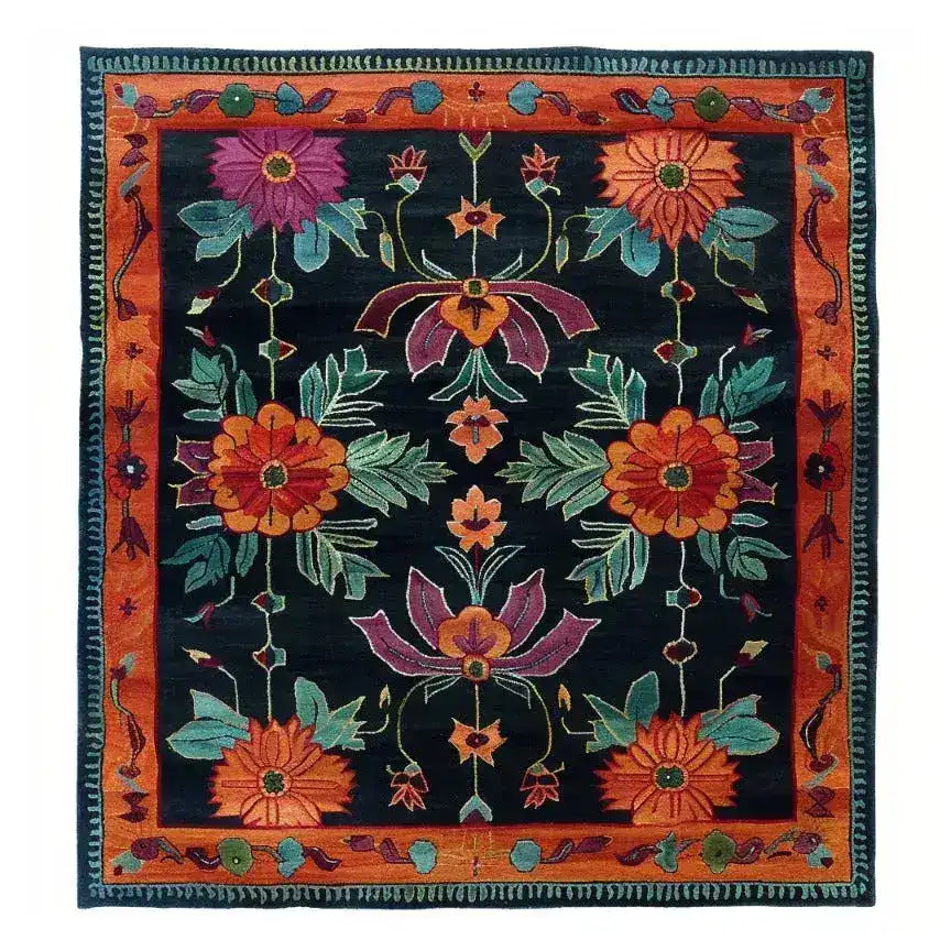 Vibrant hand-tufted wool area rug featuring a bold floral design with rich colors, perfect as a dining table rug in a dining room setting.