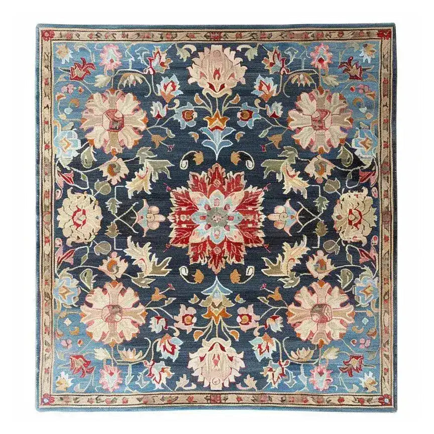 A beautifully crafted Classic Botanical Design Hand Tufted Area Rug, perfect for adding elegance to your living room. The rug features intricate floral patterns in vibrant shades, showcasing the sophistication of wool rugs, making it an ideal choice for living room area rugs.