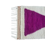 Close-up view of the Classic Bow Moroccan Berber Handwoven Wool Area Rug in pink, showcasing intricate patterns and soft textures. Ideal as a runner rug for hallways, kitchens, or bathrooms, this boho wool rug adds a touch of elegance to any space.