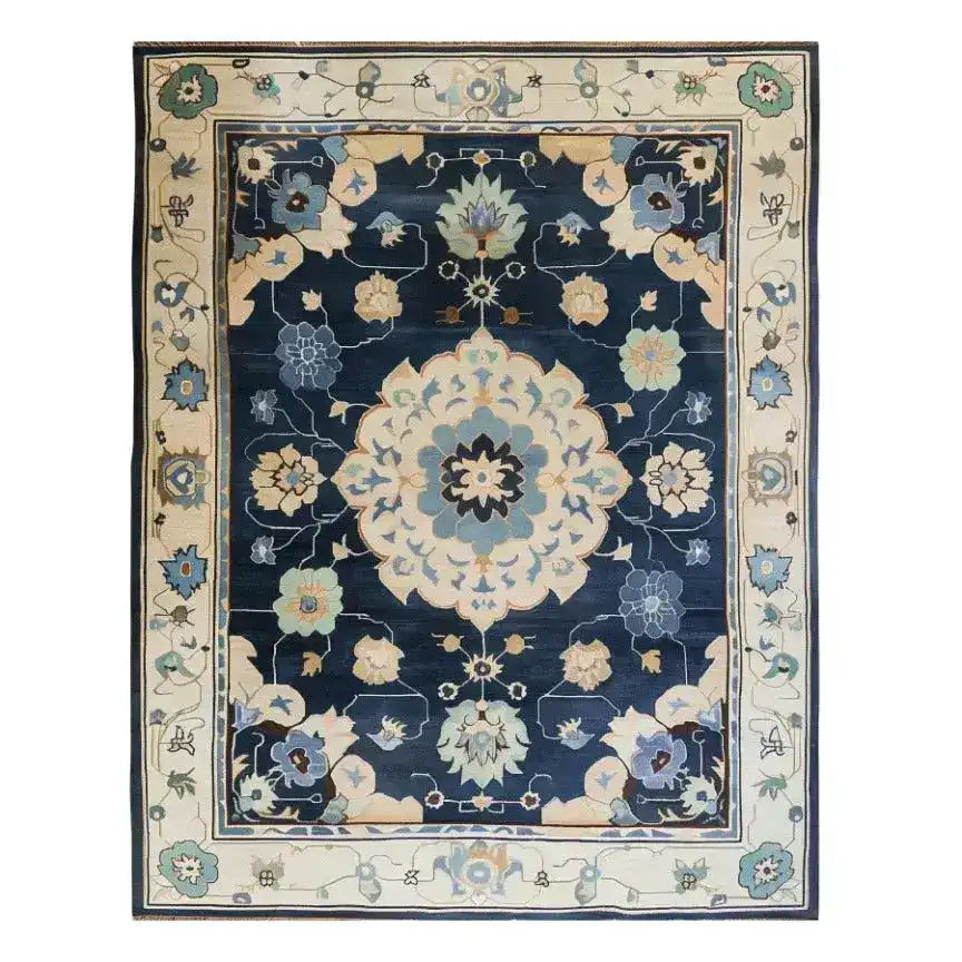 Elegant Classic Serenity Hand-Tufted Area Rug with Persian design, perfect for office or living room. This 8x10 wool rug features intricate floral patterns in soothing blues and creams, ideal as a centerpiece in area rugs for living room settings.