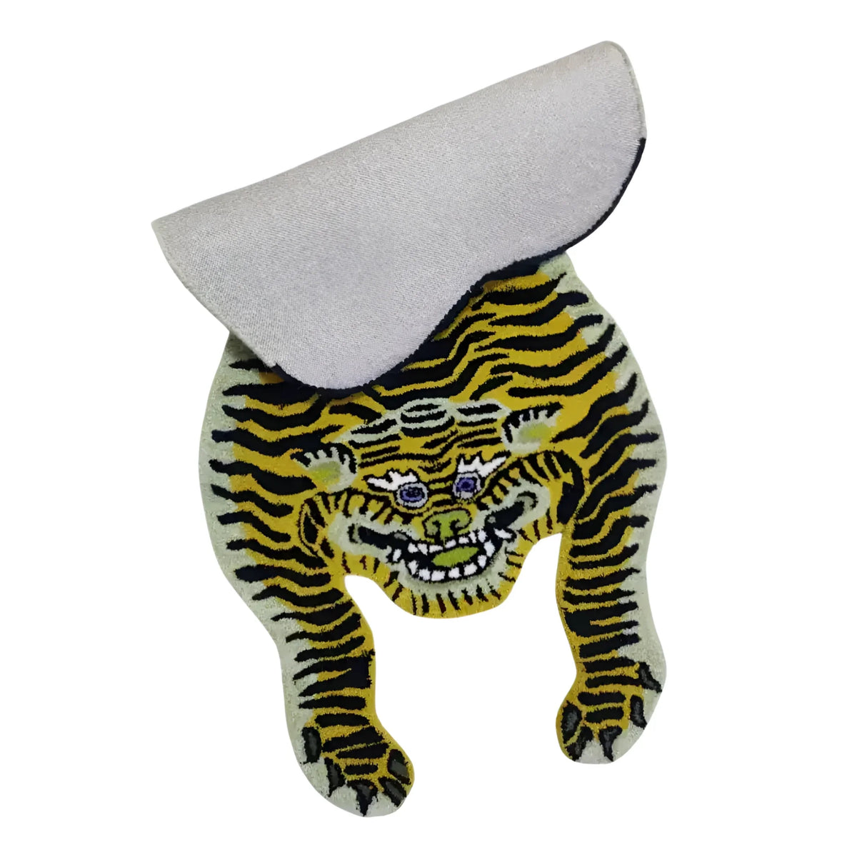 A unique Classic Tiger Yogi Accent Wool Rug with a striking tiger design, perfect for adding a bold statement to any office or bedroom. The image shows a close-up view of the rug, highlighting the detailed craftsmanship ideal for those seeking a standout area rug.