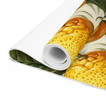 Close-up of a rolled yoga mat's cushioned coil end, showing whole-lemon print detail and white backing