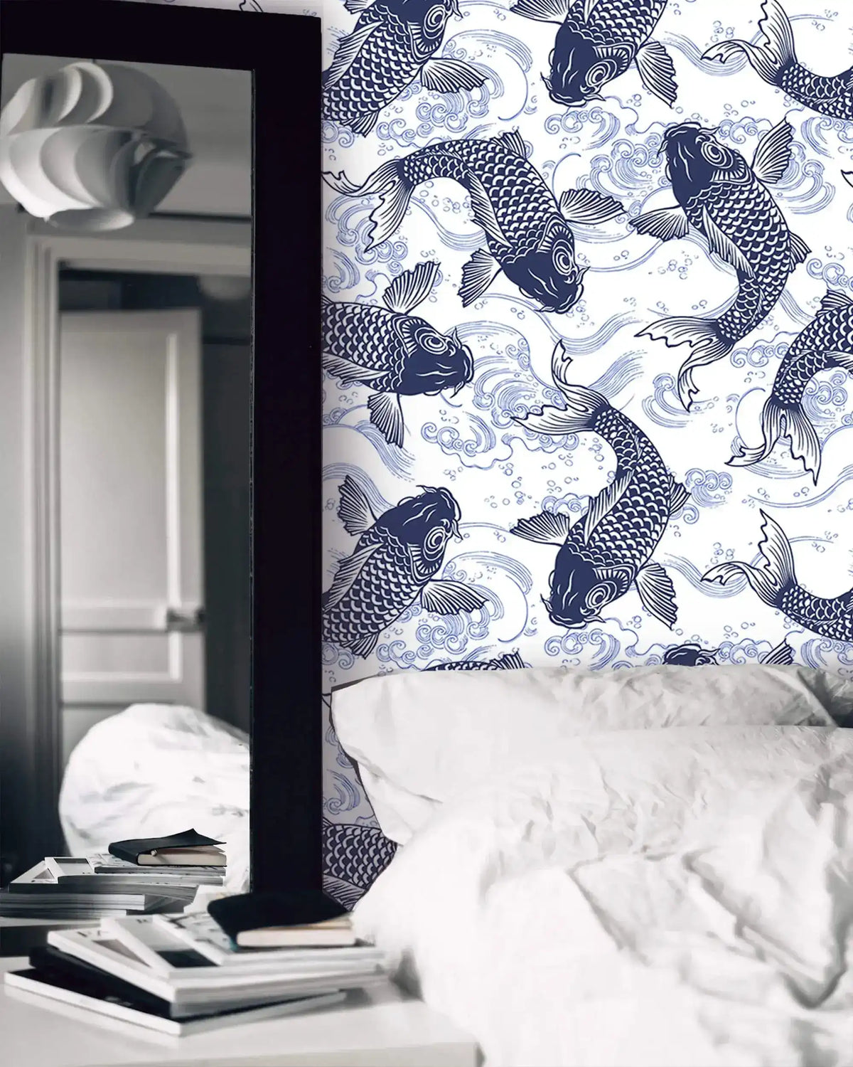 Close-up of indigo koi swimming through waves on Koi Pond Serenity wallpaper beside a mirror