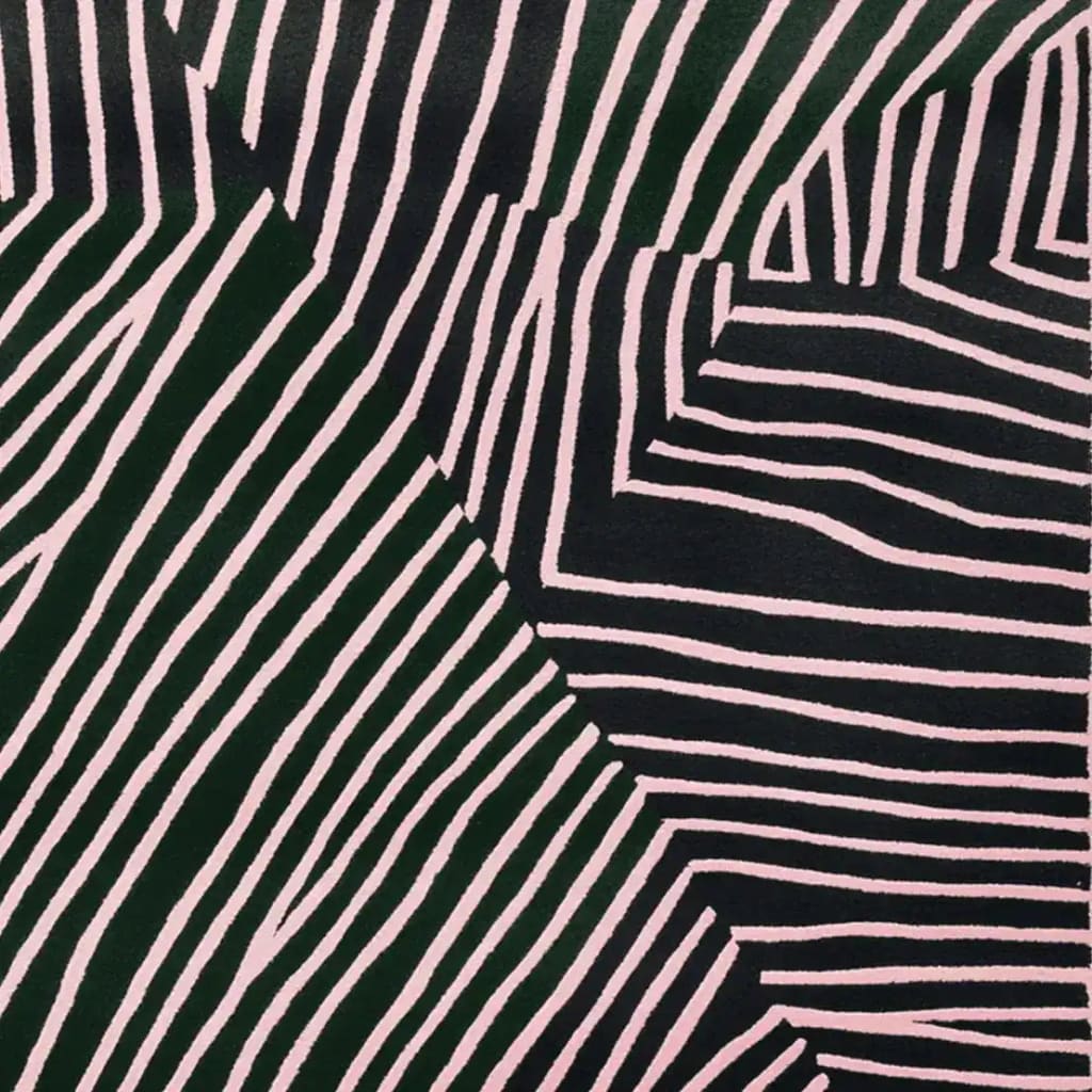 A striking contemporary square area rug featuring a dynamic pattern of black and white lines, creating an abstract, rhythmic design. Perfect for adding a modern touch to living room spaces, this wool rug offers a unique blend of style and comfort.