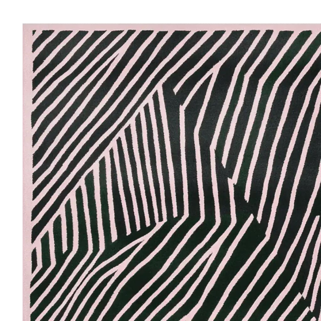 This image showcases a contemporary square area rug with bold, abstract black and white lines, ideal for adding a modern touch to any living room. Made from high-quality wool, this hand-tufted rug offers both style and comfort, making it perfect for those seeking unique area rugs for living room decor.