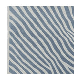 Stylish area rug featuring a contemporary zebra-like pattern with wavy blue and white stripes. Perfect for adding a modern touch to any living room, this 8x10 wool rug is a standout choice among area rugs for living rooms.