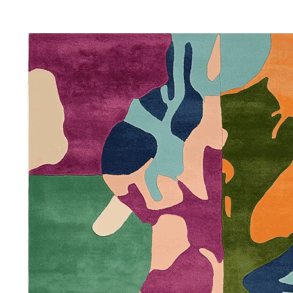 Vibrant and contemporary hand-tufted wool area rug with an abstract design in shades of purple, green, orange, and blue. This square rug is perfect for adding a splash of color to large living rooms, measuring 8x10. The Color Clash Canvas rug showcases a unique artistic pattern, making it an ideal choice for those seeking a modern touch in their home decor.