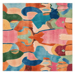 A vibrant and colorful area rug featuring an abstract design with bold, overlapping shapes in shades of blue, pink, orange, and green. This square rug is perfect for adding a contemporary touch to any living room. Hand-tufted from wool, it offers a unique artistic flair, making it an ideal choice for those seeking modern area rugs for the living room.