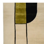 A contemporary wool area rug featuring an abstract design with black, olive green, and beige rectangles. Perfect for large living rooms, this 8x10 rug combines modern style with comfort, enhancing any space with its artistic flair.