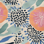 A close-up view of the Color Field Reverie Hand Tufted Rug, showcasing its vibrant abstract design. This area rug is perfect for large living rooms, featuring bold colors like coral, pink, and blue in an artistic pattern. Made from high-quality wool, this contemporary rug adds a touch of elegance and style, ideal for those seeking unique area rugs for living room spaces.