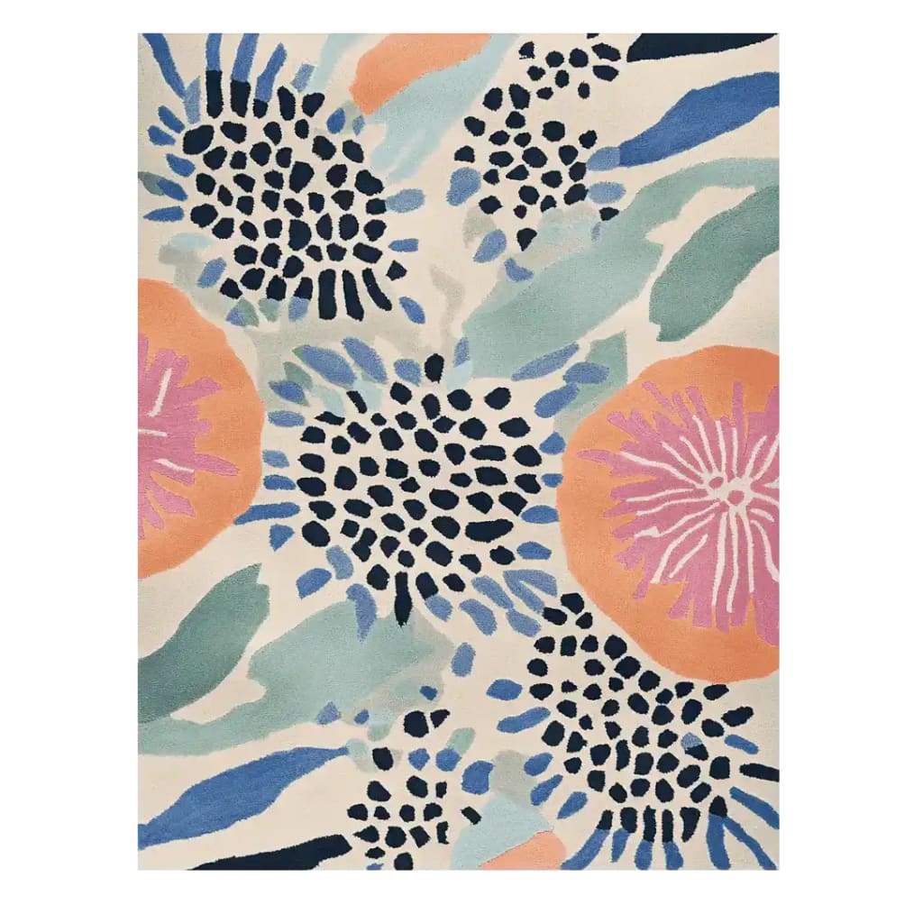 The Color Field Reverie Hand Tufted Rug showcases a vibrant abstract design with bold colors and dynamic patterns, perfect for enhancing a contemporary living space. This wool area rug is ideal for large living rooms, adding a touch of artistic flair and comfort.