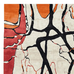 Close-up view of the Color Frame Chaos Hand Tufted Rug, a contemporary wool area rug perfect for large living rooms. The abstract design features bold black lines and vibrant orange and red hues, making it an ideal choice for living room area rugs.