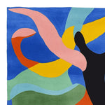 Vibrant and colorful square area rug featuring abstract shapes in blue, pink, orange, yellow, and black, perfect for adding a contemporary touch to any living room. This wool rug is ideal for those seeking an 8x10 area rug that combines artistic flair with practical function.