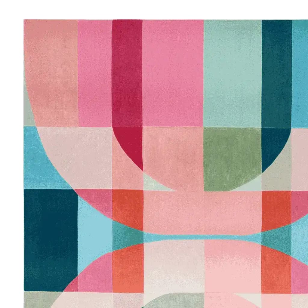 Discover the vibrant Colorfold Dream Hand Tufted Rug, a striking area rug perfect for large living rooms. This contemporary wool rug features a bold geometric design in a palette of pinks, blues, and greens. Ideal for adding a modern touch to your living room area rugs collection.