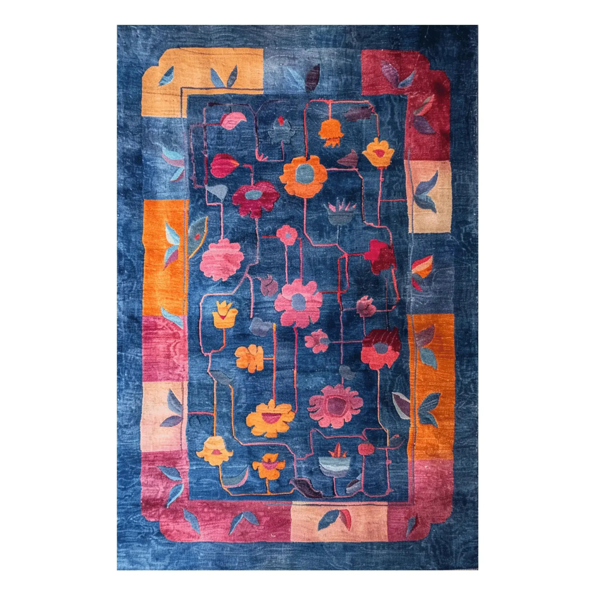 A vibrant, hand-tufted area rug featuring a colorful abstract floral design in shades of red, orange, and pink on a deep blue background. This wool rug is ideal for adding a splash of color to living room and dining room spaces, offering both style and comfort as a dining room carpet or a centerpiece in the living room.