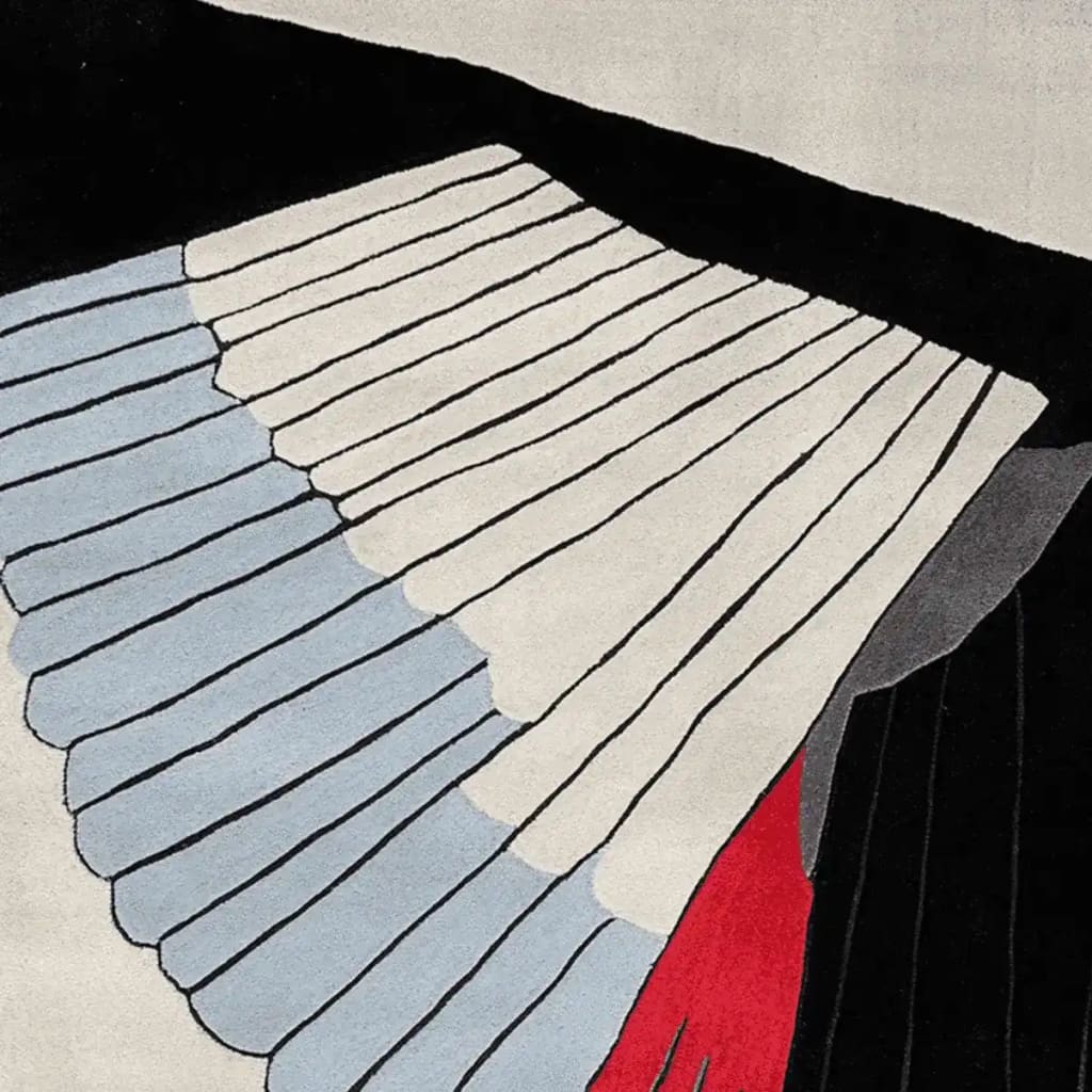 Close-up of the Concrete Currents Hand Tufted Area Rug, showcasing an abstract design in black, white, blue, and red. Perfect for large living room spaces, this contemporary wool rug adds a modern touch to your decor.