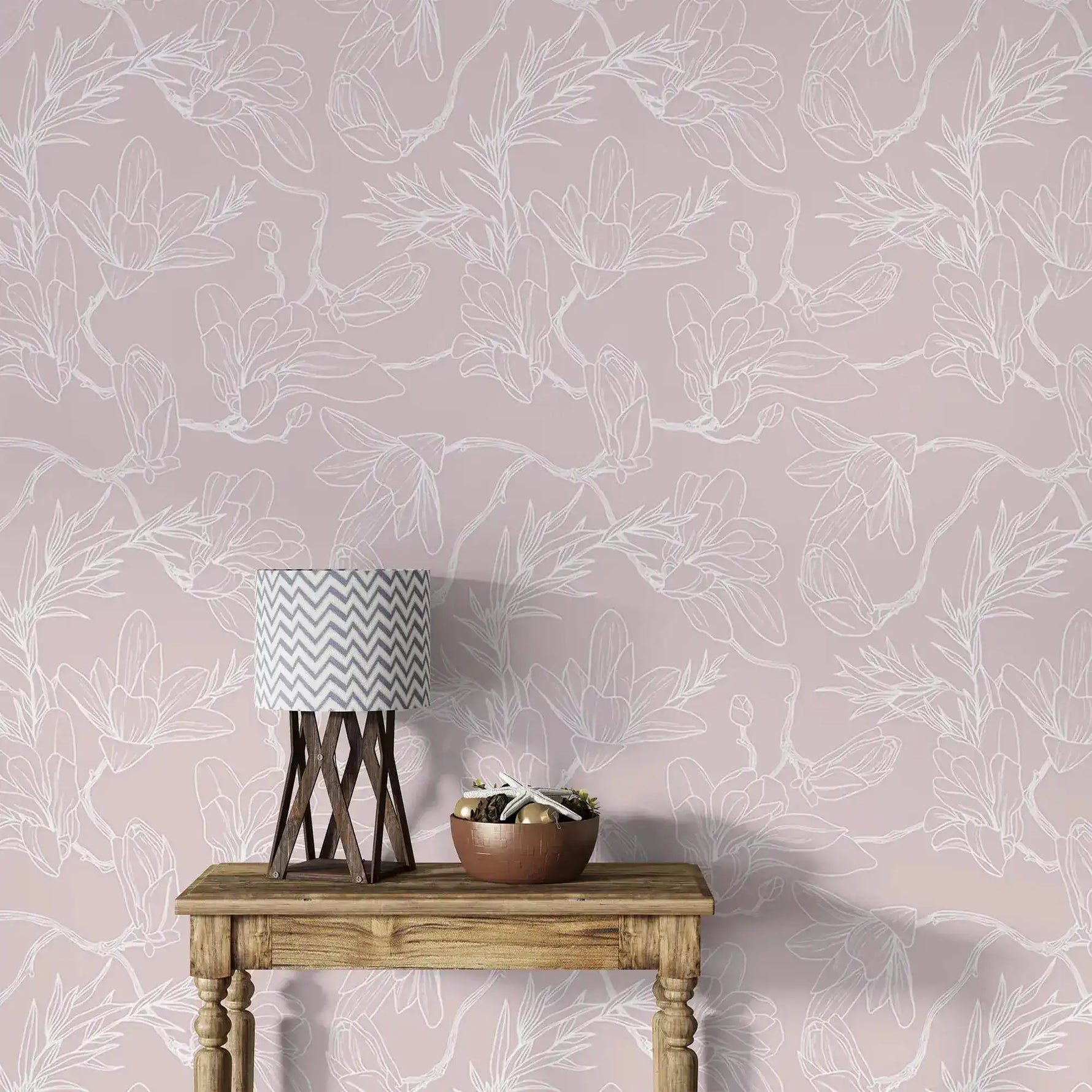 Console with chevron lamp against pink floral sketch wallpaper, white outlined flowers on pink