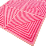 This image showcases a vibrant Contemporary Hot Pink Geometric Hand Tufted Wool Rug, perfect for adding a bold statement to large living room rugs or dining room carpets. The rug features striking geometric patterns in various shades of pink, ideal for enhancing the decor of a dining room or living room with a touch of modern style.