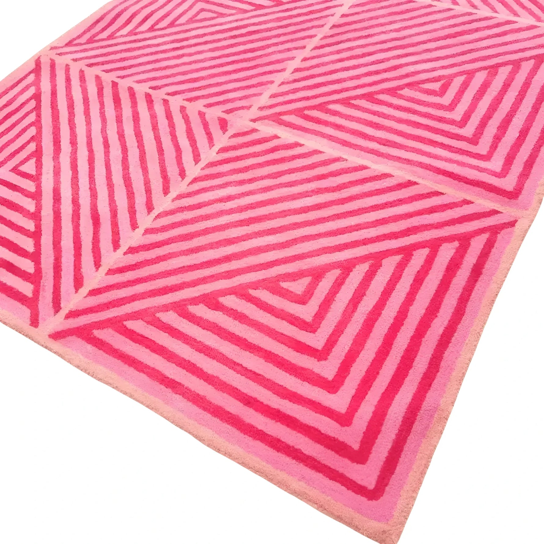 This image showcases a vibrant Contemporary Hot Pink Geometric Hand Tufted Wool Rug, perfect for adding a bold statement to large living room rugs or dining room carpets. The rug features striking geometric patterns in various shades of pink, ideal for enhancing the decor of a dining room or living room with a touch of modern style.