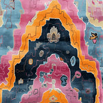 Vibrant contemporary area rug with an abstract prismatic design, featuring bold colors like orange, pink, blue, and black. This hand-knotted wool rug is perfect for adding a modern touch to any living room.