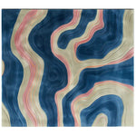 A stunning area rug with a contoured design featuring swirling patterns in blue, pink, and beige, creating a tranquil and abstract look.