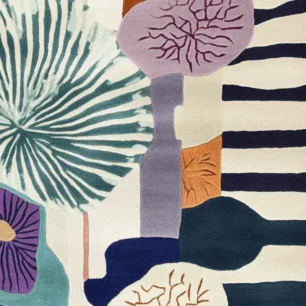 A vibrant hand-tufted area rug showcasing an abstract design with bold colors including teal, purple, and orange. This contemporary wool rug is perfect for adding a splash of color to living rooms, especially in an 8x10 size. Ideal for those seeking stylish and modern area rugs for living room decor.