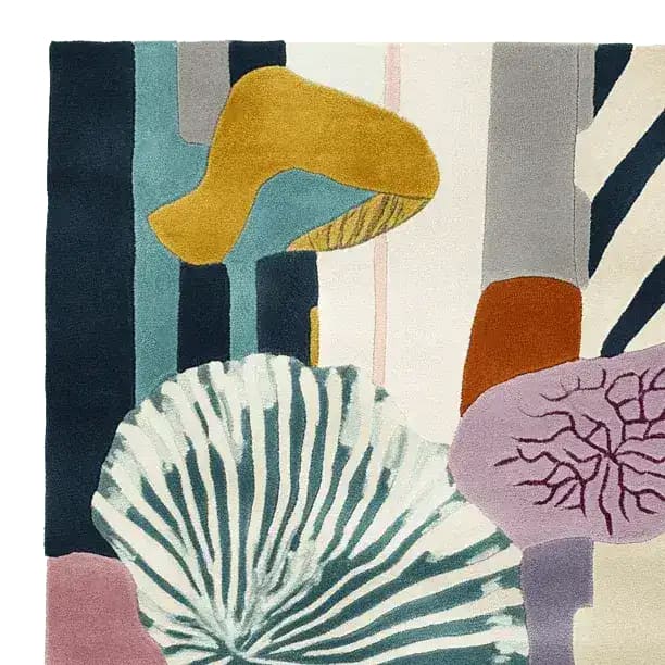 Top view of the Coral Code Hand Tufted Rug, showcasing its vibrant abstract design with bold colors and patterns. This contemporary wool area rug, perfect for an 8x10 living room, features a unique blend of artistic elements, making it an eye-catching centerpiece for your space.