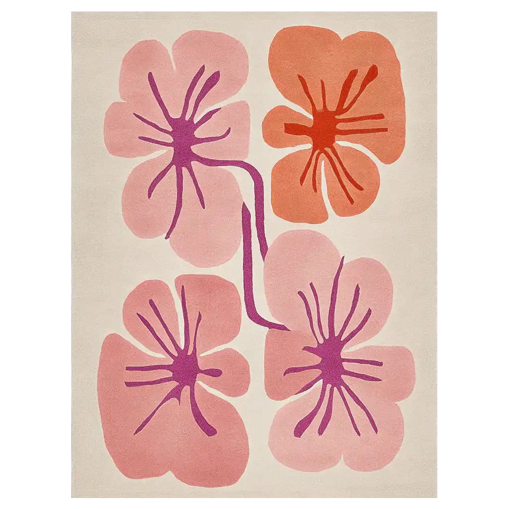 A beautifully designed area rug featuring a hand-tufted wool construction with abstract floral patterns in shades of pink and orange. The vibrant colors stand out against a neutral background, creating a striking centerpiece for any room.