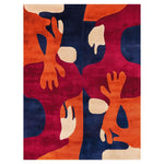 Vibrant Coral Reef Dreamscape Hand Tufted Wool Area Rug featuring an abstract design with bold red, orange, and deep blue colors. The rug showcases a unique pattern reminiscent of coral shapes, providing a striking focal point for any room.