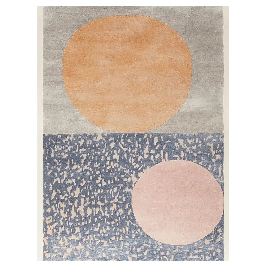 Cosmic Bloom Hand Tufted Wool Area Rug showcasing an abstract design with large peach and pink circles on a textured grey and blue background, creating a modern and stylish look.