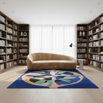 Modern living room with a brown sofa, colorful rug, and bookshelves.