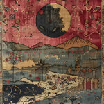 A beautifully detailed Countryside Charm Hand Knotted Area Rug featuring an intricate vintage design with a blend of reds, blues, and earthy tones. This square wool rug is perfect for adding a touch of elegance to your living room or office, showcasing a stunning landscape scene with mountains and floral patterns.