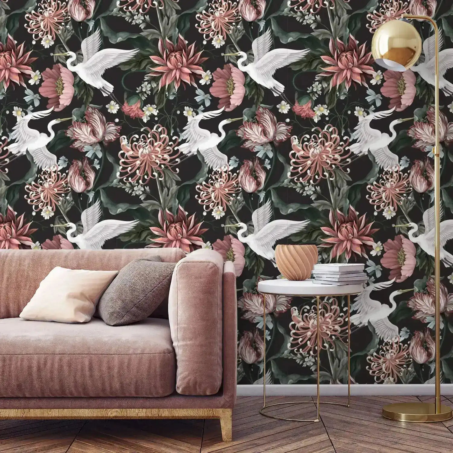 White crane blooms wallpaper behind pink velvet sofa; cranes in flight over blush chrysanthemums on dark ground