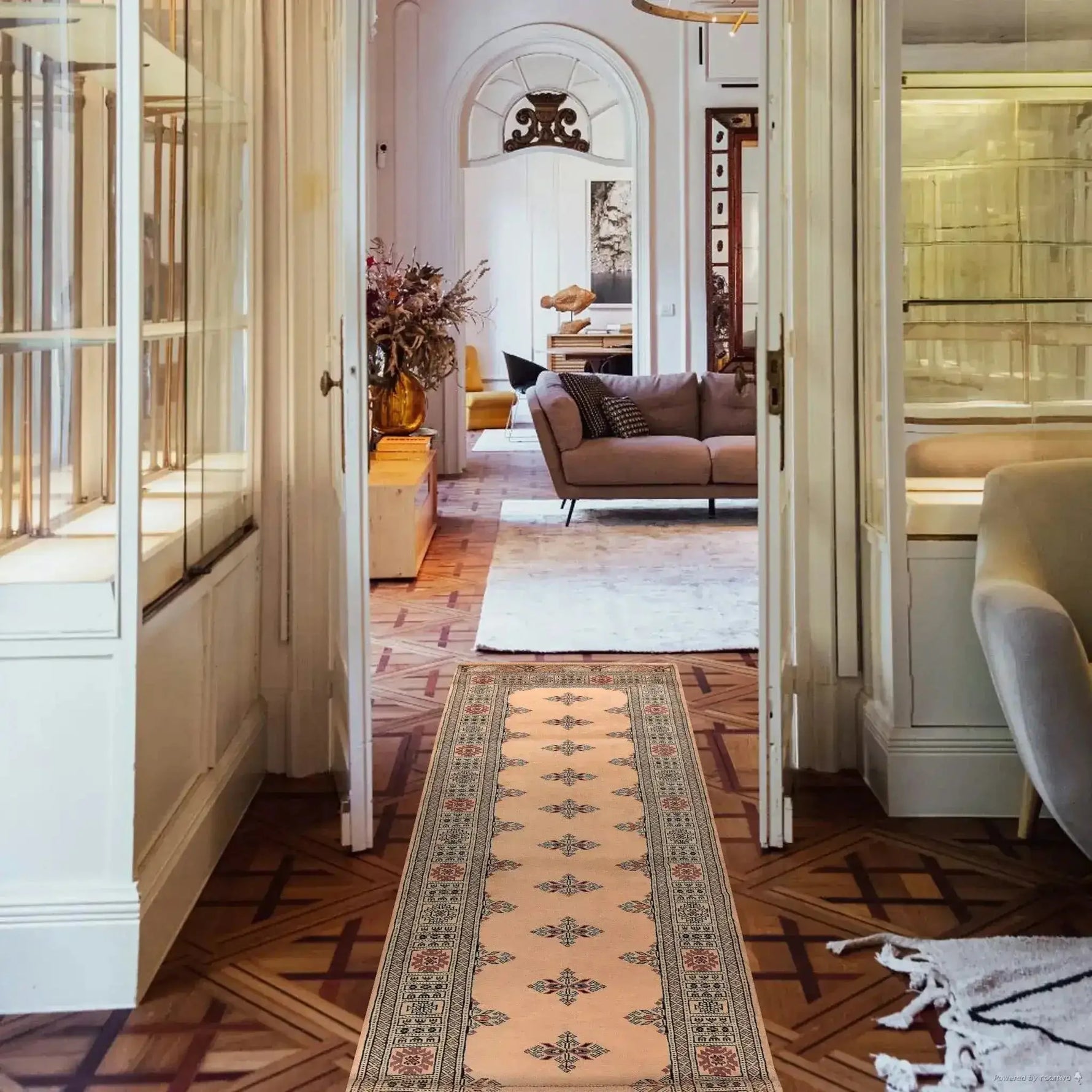 Beautifully designed Cream Javarak Wool Hand Knotted Area Rug Runner displayed in an elegant hallway leading to a cozy living room. This area rug adds a touch of sophistication to the space, perfect for enhancing any living room area rugs setup.