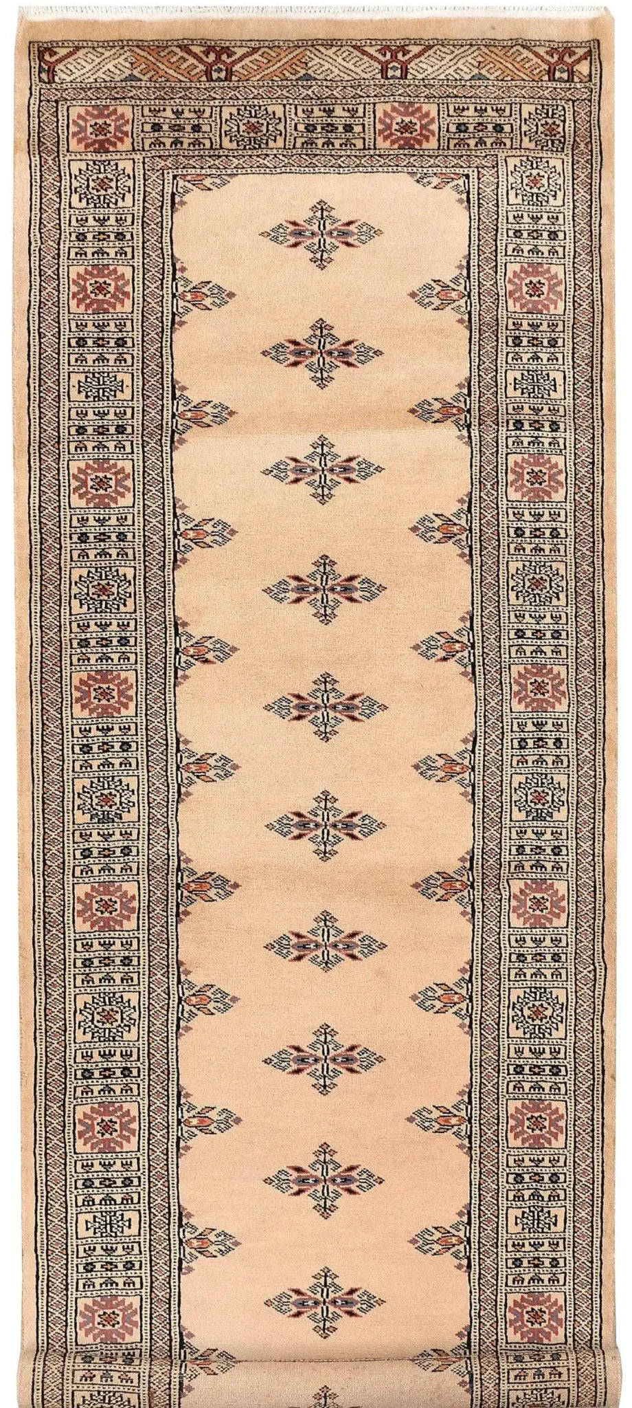 A beautifully detailed Cream Javarak Wool Hand Knotted Area Rug Runner featuring intricate geometric patterns and a rich border design. The rug showcases a warm cream color with subtle accents, perfect for adding elegance to any hallway or narrow space.