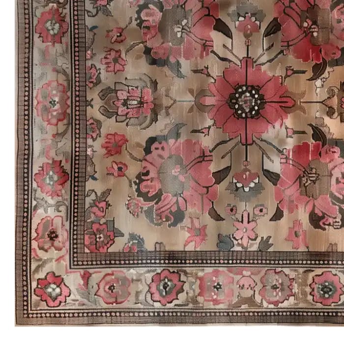 Top view of the Crimson Bloom Hand Tufted Wool Area Rug featuring a vibrant floral pattern in shades of red and pink, bordered by intricate designs, perfect for adding elegance to any room.