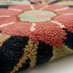 Close-up of a textured rug with geometric pattern