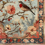 Elegant Crimson Companions Hand Knotted Area Rug featuring a vibrant floral design with a bird perched on a branch, perfect for enhancing living room decor. This Persian-style rug is ideal as an 8x10 living room rug, adding a touch of nature-inspired elegance and charm.