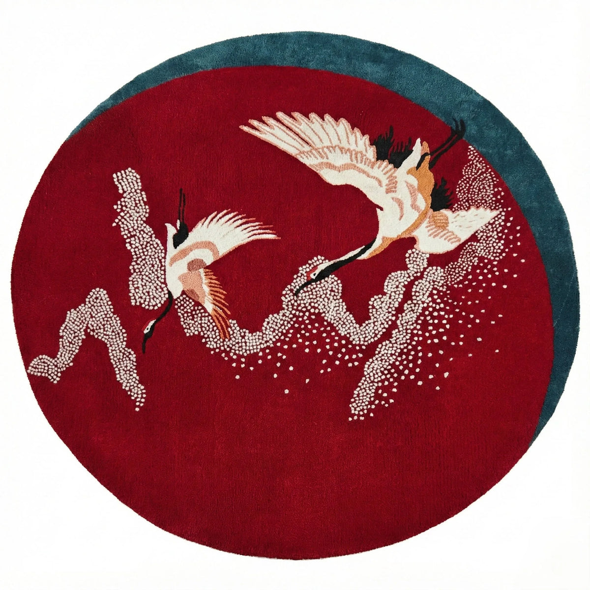 The "Crimson Flight Hand Tufted Round Rug" features a stunning red design, offering elegance, softness, and timeless beauty to any space.