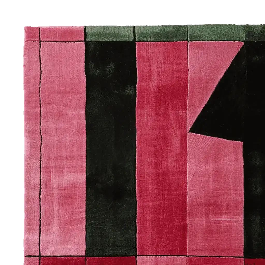 Close-up view of the Crimson Grid Fold Hand Tufted Rug, showcasing its contemporary design with bold red and black geometric patterns. This wool area rug is perfect for adding a modern touch to any living room space.