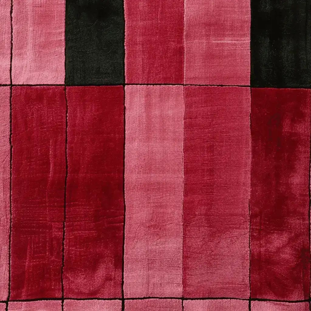 Close-up view of the Crimson Grid Fold Hand Tufted Area Rug, showcasing its bold red and black contemporary design. This wool rug adds a modern touch to area rugs for living rooms.