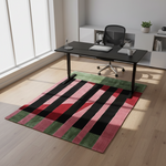 Colorful plaid rug on a wooden floor in an office setting with a desk and chair.
