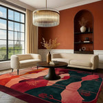 A beautifully decorated living room featuring a Crimson Valley Hand Tufted Rug, perfect for large living rooms or office spaces. This wool area rug boasts vibrant colors and an abstract design, complementing the modern furniture and chandelier. The large window offers a stunning view, enhancing the cozy atmosphere.