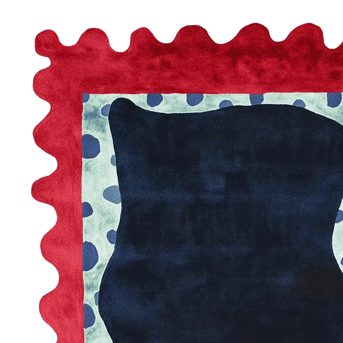 Close-up view of the Crimson Wave Pebbles Hand Tufted Area Rug, featuring bold red and navy abstract patterns with light blue polka dots, perfect as a contemporary wool rug for living rooms.