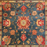 A beautifully designed Cultural Blossom Legacy Hand Knotted Area Rug featuring vibrant floral patterns in red, orange, and beige against a rich blue background. This vintage square area rug is perfect for adding a touch of elegance to large living rooms or dining rooms, complementing both modern and traditional decor. Crafted from high-quality wool, it embodies the timeless beauty of Persian rugs, making it an ideal choice for under a dining table or as a centerpiece in a living room.